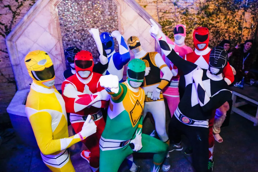 Group photo in onesies at a participating venue